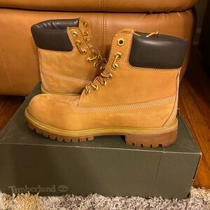 Tan Timberlands boots. Good for wearing regularly and winter to keep feet warm.